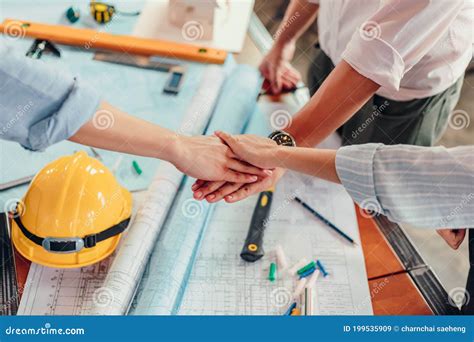 Engineer And Architect Partners Team Work Join Hands Together Group