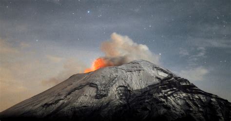 Mexicos Popocatepetl Volcano Spews Ash Into A Starry Night