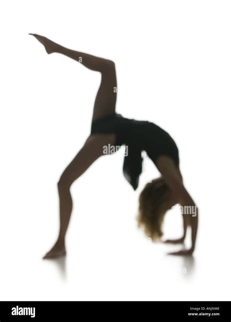 Side Profile Of A Young Woman Bending Over Backwards Stock Photo Alamy