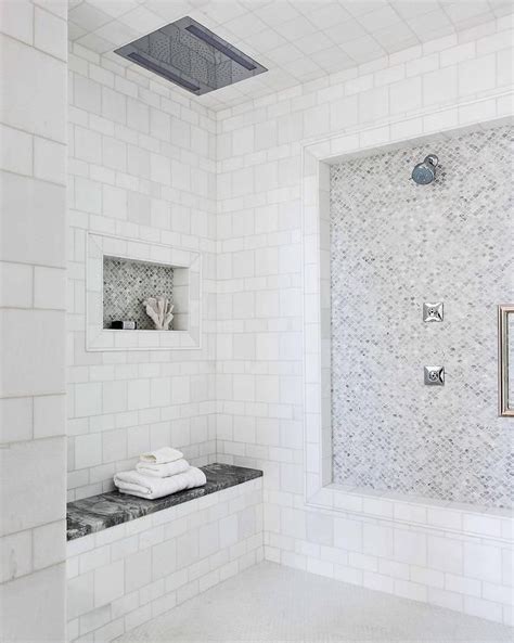 Large Walk In Shower Designed With Small Fan Shaped Marble Tiles In A