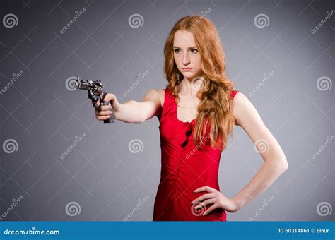 Pretty Young Girl In Red Dress With Gun Isolated Stock Image Image Of