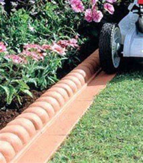 Edging your lawn is the difference between mowing it and manicuring it. Mow-over flower bed edging Ideas Collection | How Do It Info