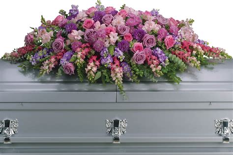 Lavender Tribute Casket Spray Arranged By A Florist In Endicott Ny