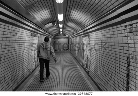 Man Walking Alone Through Tunnel London Stock Photo Edit Now 39548677