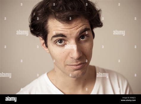 Portrait Of Young Happy Man With Funny Hilarious Faces Having Fun