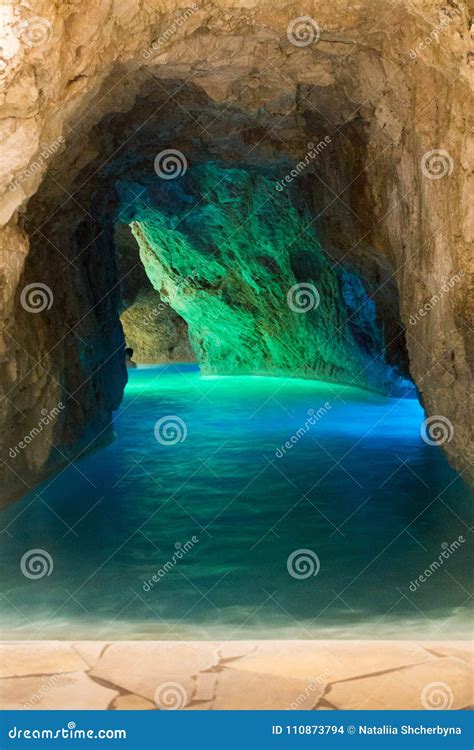 Entrance To Stone Cave With Blue Water Beautiful Spa Resort Rocky Sea