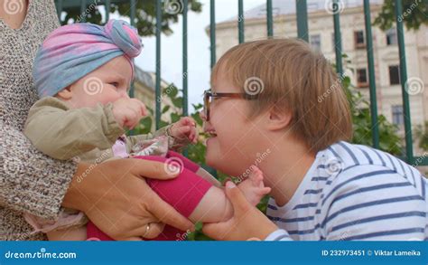 Eye Contact Teenager Down Syndrome Little Girl Invisible Bond Brother