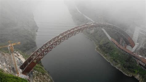 Worlds Longest Span Asymmetric Arch Bridge Closes In Central China Cgtn