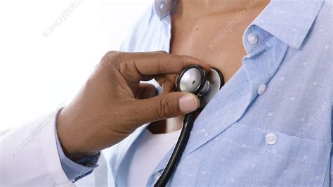 Woman Having Chest Examined With Stethoscope Stock Video Clip K007