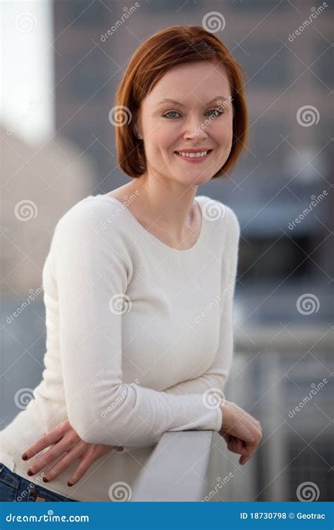 Attractive Thirties Caucasian Woman Smiling Royalty Free Stock Photos