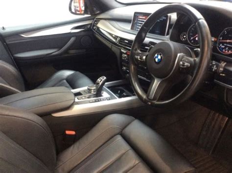 Do not install the driver side seat track bolts yet. BMW X5 M Sports 7 Seats