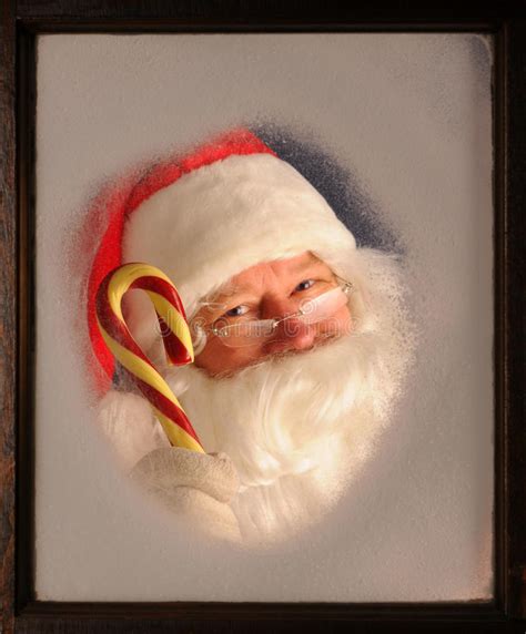 Santa Claus In Window With Candy Cane Stock Photo Image Of Costume