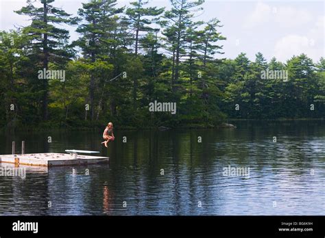 Jumping Off Swimming Float Damariscotta Lake Maine Stock Photo Alamy