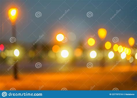 Abstract Background With Bokeh From Light Of Night Lights Car