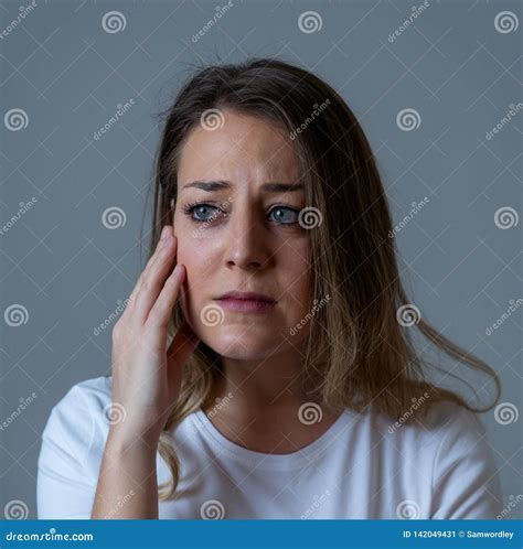Young Attractive Woman Sad And Depressed Feeling Desperate Human Expressions And Emotions Stock