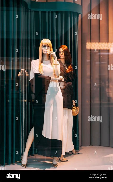 Female Mannequin In Shop Window Showcase Of Store Mall Market Fashion