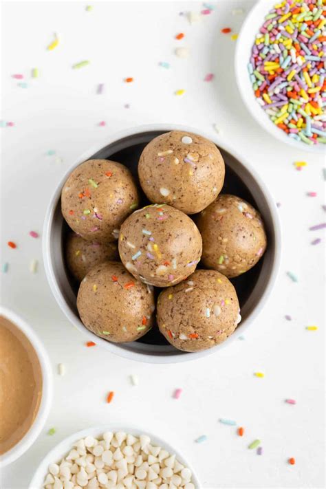In a bowl, mix together cashew butter, maple syrup, and almond extract. Birthday Cake Energy Balls | Purely Kaylie
