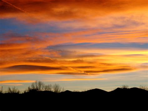 Download high quality images for free. Orange and Blue Sunset over Rolling Hills Picture | Free ...