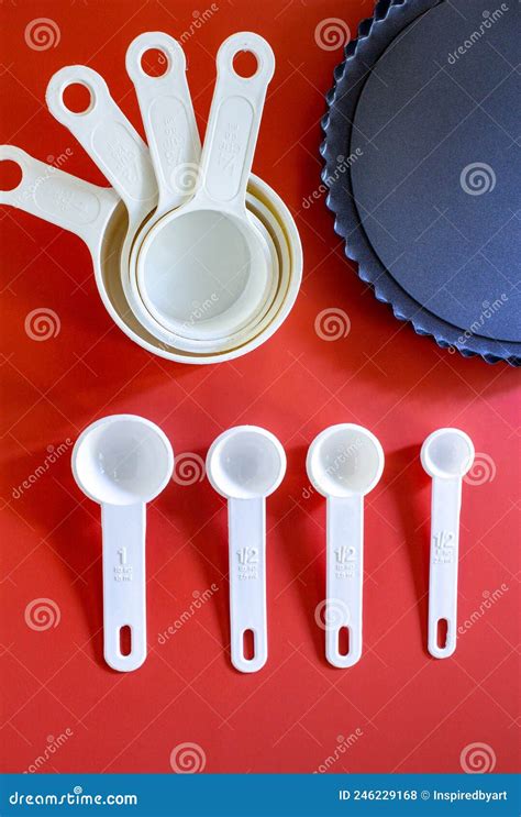 Set Of White Measuring Cups Measuring Spoons Use In Cooking Lay On