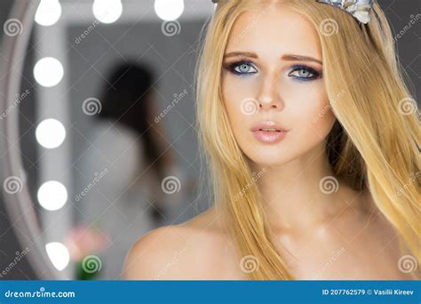 Woman With Blond Hair And Blue Eyes In Room With Mirrors Stock Image Image Of Lady Blond