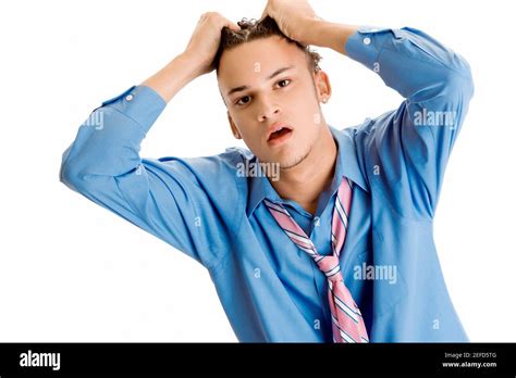 Portrait Of A Young Man Pulling His Hair Stock Photo Alamy