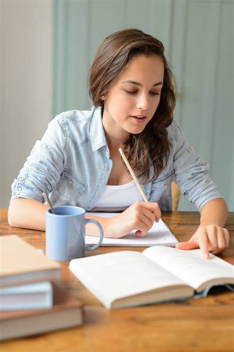 Teenage Student Girl Studying Book At Home Stock Photo Image 42704944