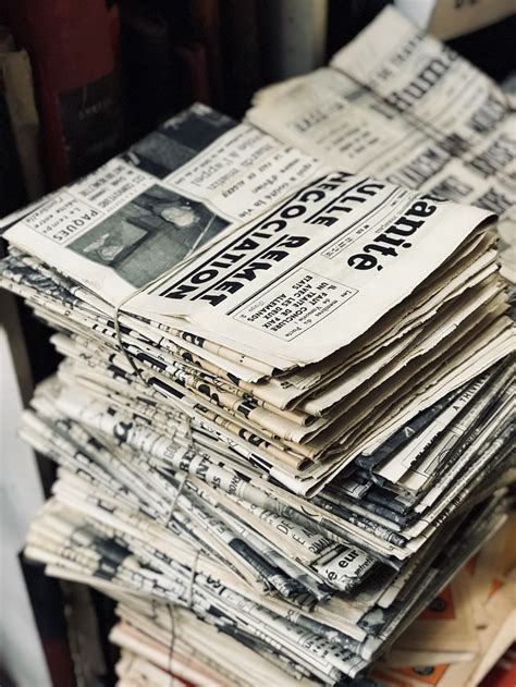 Bundle Of Newspaper On Table Photo Free Paper Image On Unsplash