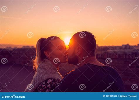 couple in love kissing at evening in sunset stock image image of girl enjoy 162043317