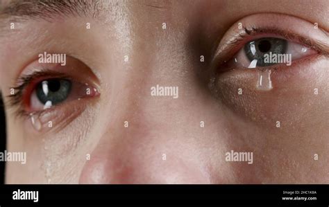 Close Up Image Of The Womans Tearing Eye Stock Photo Alamy
