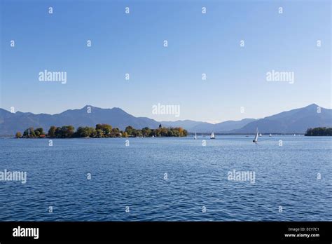 Lake Chiemsee With Fraueninsel Island Behind The Chiemgau Alps