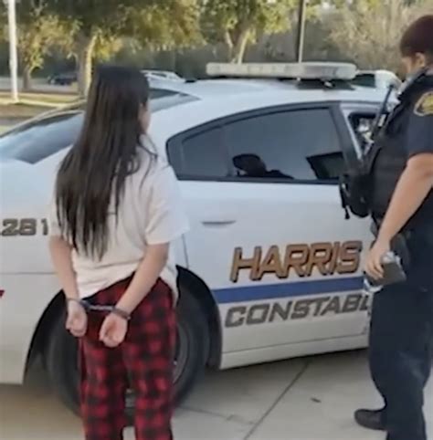 Shocking Moment Girl 11 Is Put In Handcuffs And Hauled Away By Cops Over Prank Fire Call
