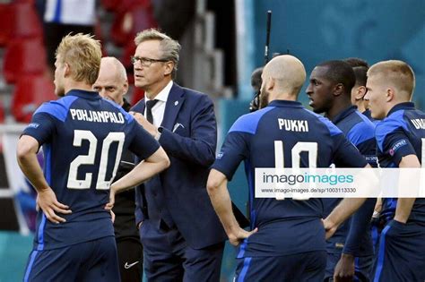 team of finland and coach markku kanerva return the pitch to resume during uefa euro em