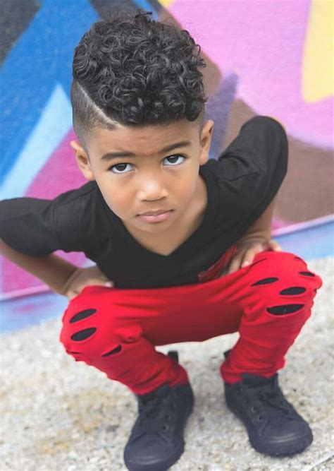The faded hairstyle with a side part is one of the cutest ways to style your toddler's hair. Natural Curly Hairstyles for Men (Trending in July 2020)