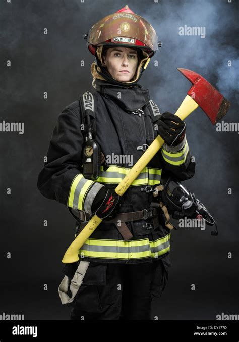 Female Firefighter In Structural Firefighting Uniform With Breathing