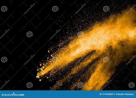 Deep Yellow Dust Particle Splattered On Black Background Stock Image