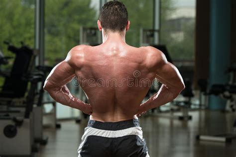 Young Bodybuilder Flexing Muscles Stock Image Image Of Exercise