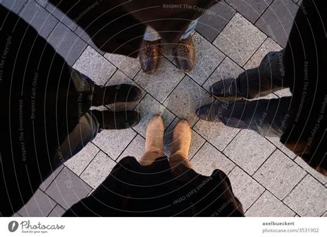 Pairs Of Feet Friends Stand In A Circle A Royalty Free Stock Photo From Photocase