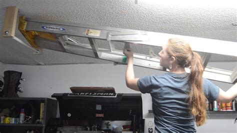 How To Hang A Ladder From The Ceiling Ladder Storage Hanging Ladder