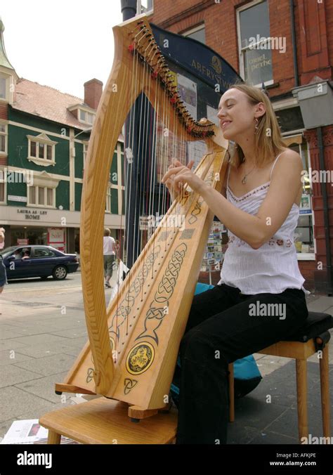 Girl Playing Harp Hi Res Stock Photography And Images Alamy