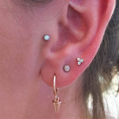 Tragus Done By Tyranosaurusbexx And Upper Lobe Piercings By Piercingsbycl At Pierced