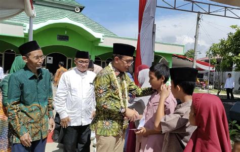 Hadiri Peringatan Isra Mi Raj Pj Bupati Bekasi Bersama Baznas Salurkan