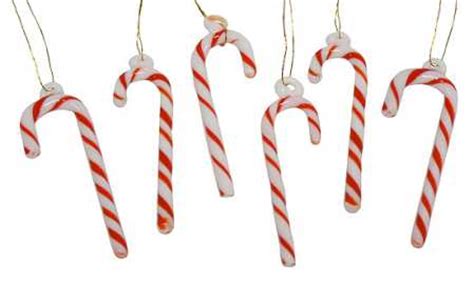 They started as straight white sugar sticks and a few years later the red stripes were added. Miniature Glass Candy Cane Ornaments - Christmas Ornaments ...