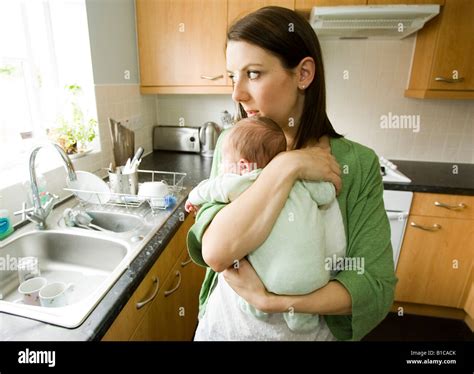 Woman Alone With Baby Stock Photo Alamy