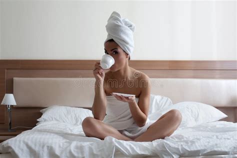 Young Woman Drinking Coffee In Bed Stock Image Image Of Full Towel