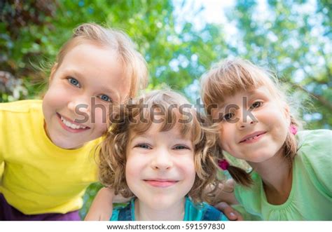 Group Happy Children Playing Outdoors Kids Stok Fotoğrafı 591597830