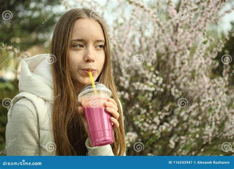 A Girl Is Drinking Pink Smoothies Stock Image Image Of Caucasian Juice 116243947