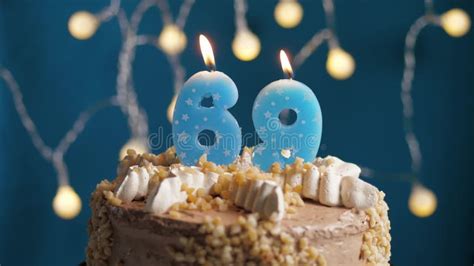 Birthday Cake With 69 Number Candle On Blue Backgraund Stock Image