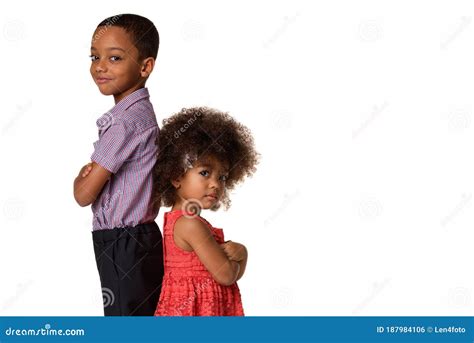 Childhood And People Concept Two African American Siblings Standing