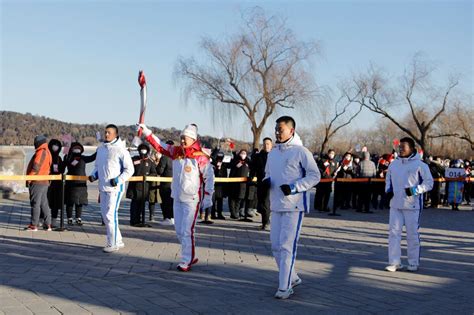 torch relay begins final stretch ahead of winter games opening ceremony reuters