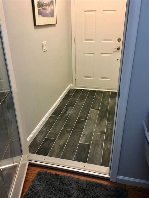 New tile for entryway floor. Tile is from Menards. Entryway Flooring